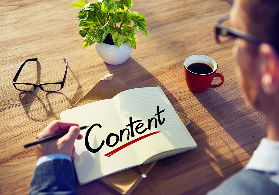 Businessman Writing the Word Content